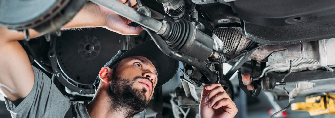 Mechanic taking a look at a vehicle - Car Repairs Colchester
